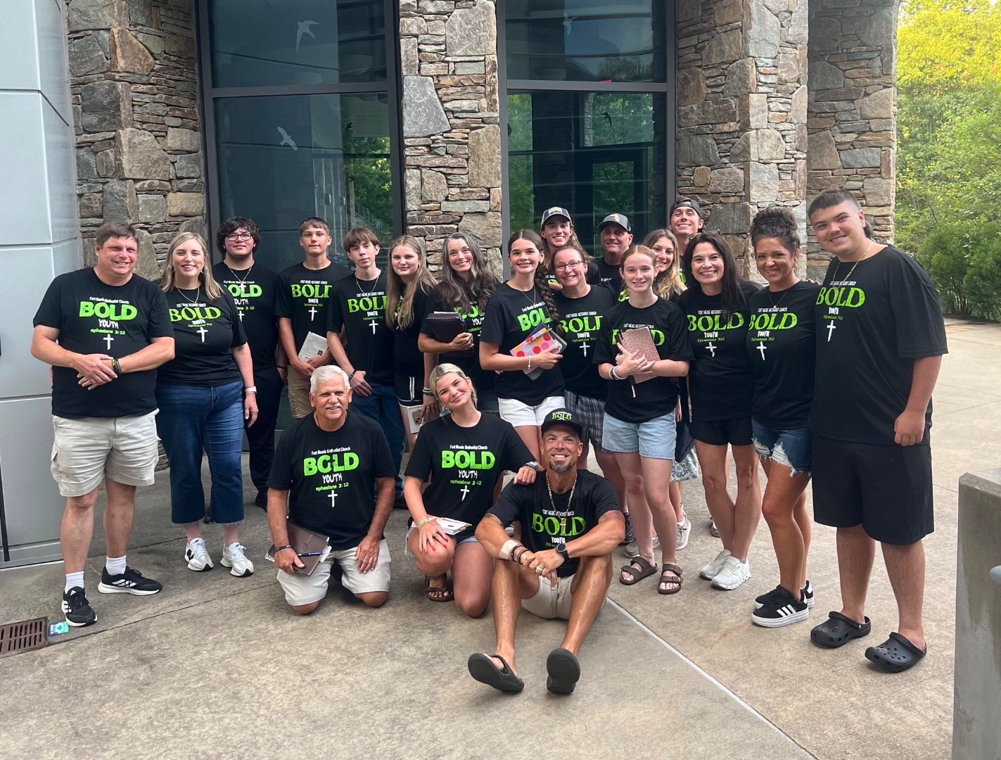 Bold Youth group photo in matching shirts at a retreat